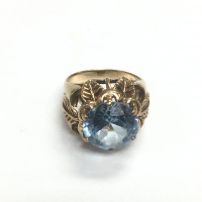 A large 9ct gold ring set with an aquamarine stone, approx 7g. Shipping category A.