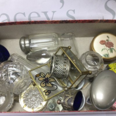 A box containing a glass condiments set, including a silver hallmarked piece and other oddments