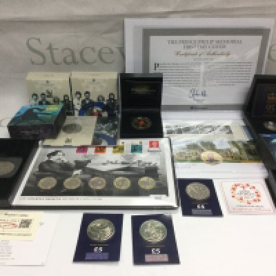 A collection of proof coins including a Prince Philip &pound;5 coin, a limited edition Charles Dickens coin cover and others. Shipping category B.