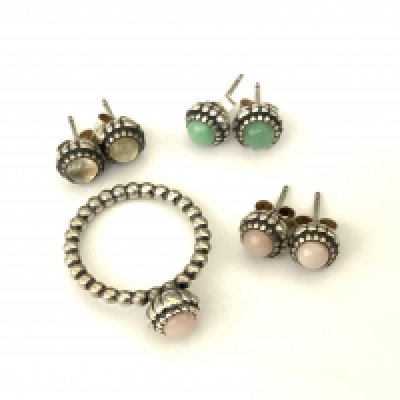 A Genuine sterling silver Pandora birthstone ring together with 3 pairs of matching stud earrings. (A)