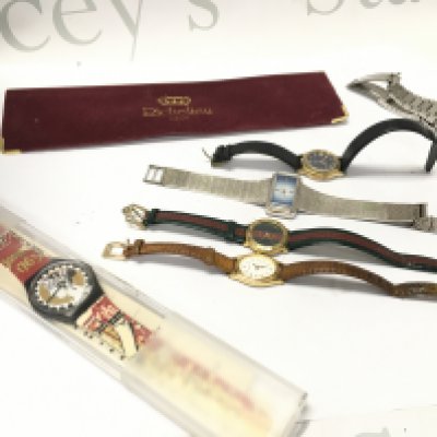 Collection of Watches including a Ladies Gucci watch, mid 20th century swiss ladies silver Morago watch, swatch and a vintage Ingersol watch. Postage category B