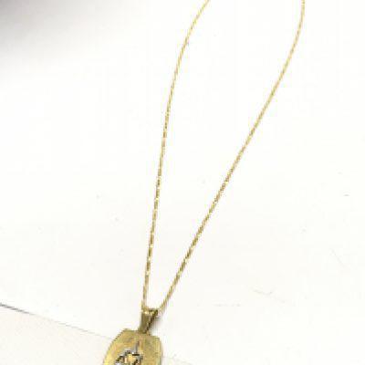 An 18ct gold pendant with a 585 gold chain, 5.4g. Postage category a