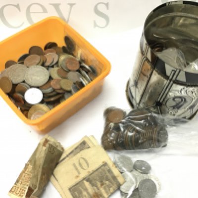 A collection of mixed used world coinage , late 20th century . Postage category B