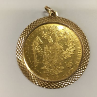 A mounted gold ducat coin in mount. 21.53g