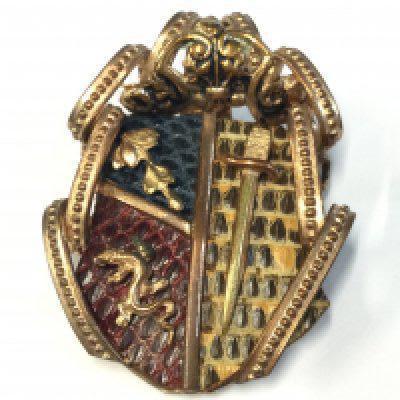 An Edwardian coat of arms shield sword brooch. Possibly German Postage category A