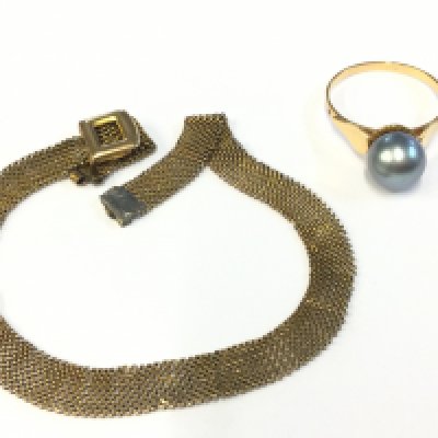 A gold ring, 8ct gold bracelet. 6.3G total weight. Postage category A