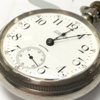 A large waltham silver railway pocket watch , postage category A