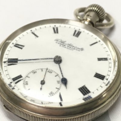 A James Walker of london silver pocket watch, seen working. Postage category A