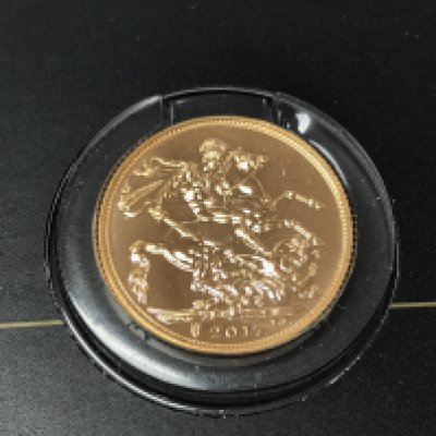 A 2017 full sovereign. Postage A