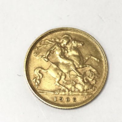 A 1906 half sovereign. Postage A