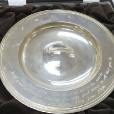 A silver dish in fitted box by Mappin and Webb. Approximately 20cm diameter. Postage B