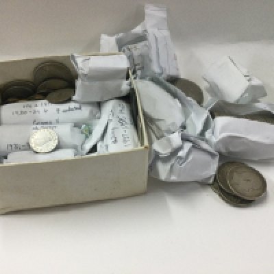 A collection of uncirculated British coinage.