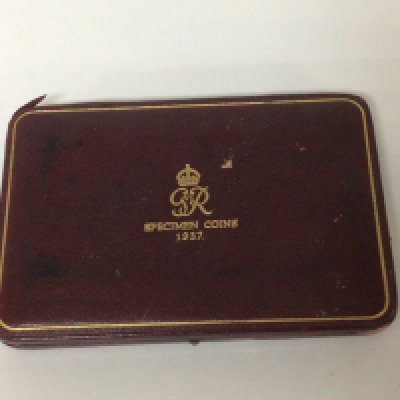 A 1937 George VI specimen coin set.