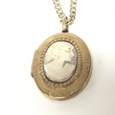 A 9carat gold locket with applied cameo with attached 9carat gold chain weight 13.5g