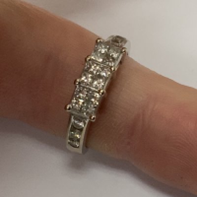 An 18ct white gold illusion set diamond ring, Size L, (A)