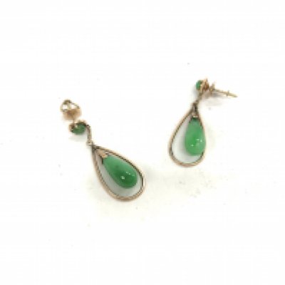 A 14ct gold pair of jade earrings. Approx weight 4.17 grams.