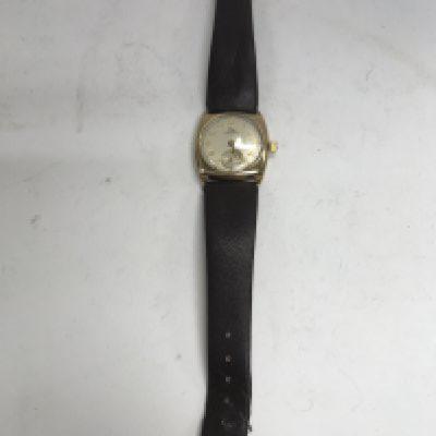 A 9ct gold record wristwatch.