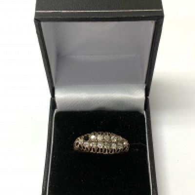 A 9ct gold ring set with multiple diamonds approx. 0.40ct. (Size S), 1 stone missing (A)
