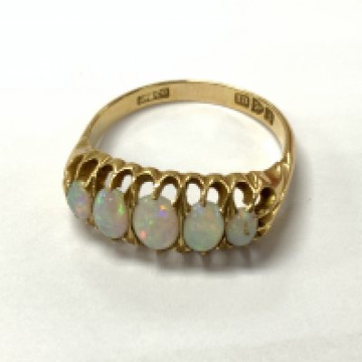 18ct five stone opal ring. Approximately size P. Postage category A.
