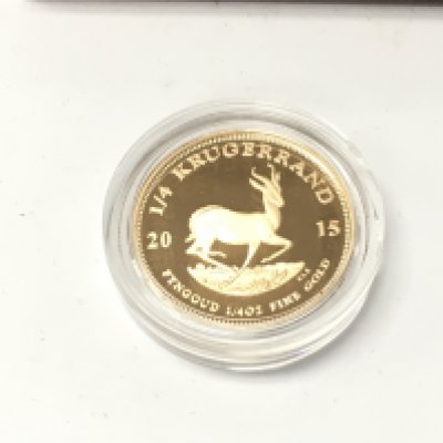 A 2015 krugerrand 1/4 oz proof coin with COA.