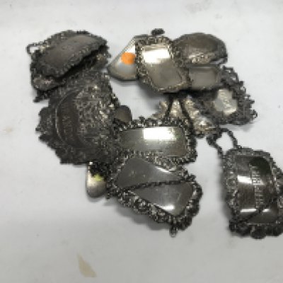 A collection of silver Hallmarked liquor necklets.
