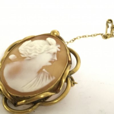 A Cameo brooch. Postage category A