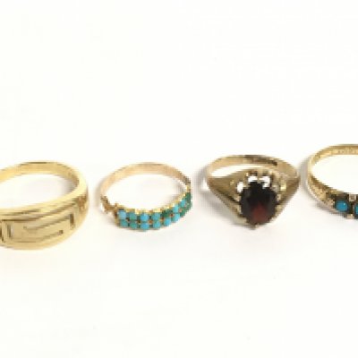 Four gold rings sizes T,L,L/M,P. Some turquoise stone set rings and a Garnet stone set ring.11.2g Postage category A