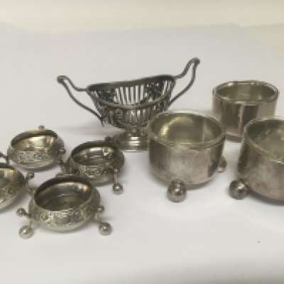 A Collection of Victorian silver salts London and Sheffield hallmarks three with glass liners.