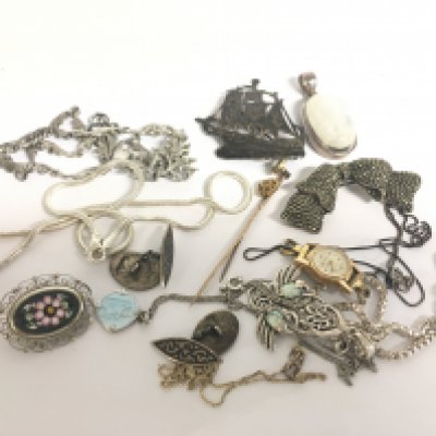 A collection of silver jewellery including a vintage 18k gold cased MuDu watch and a 9ct gold stick pin. Postage category A