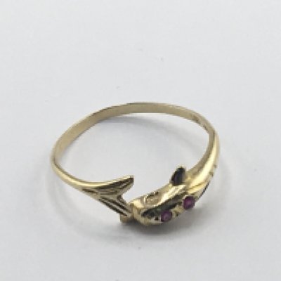 A 14carat gold ring set with ruby and in the form of Dolphins. Weight 1g