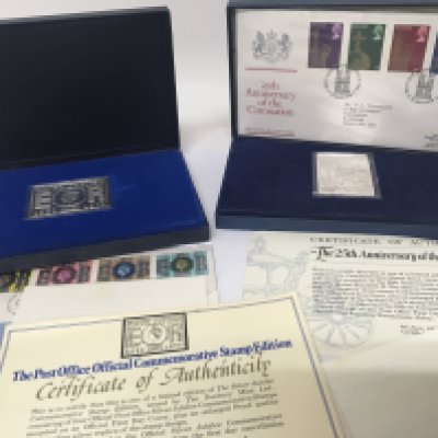 Two Sterling Silver 2.5oz Commemorative 1977 silver jubilee limited edition stamps in fitted cases with paperwork.