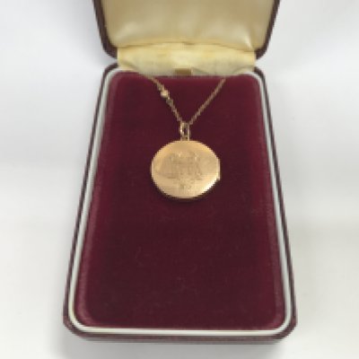 A 15ct gold locket on a chain approx 6.57 grams.
