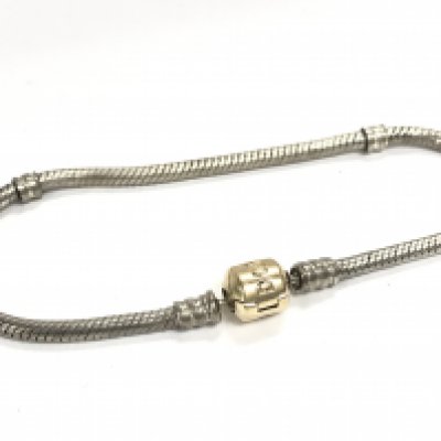 A silver Pandora bracelet with a 14ct gold clasp. Postage category A