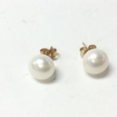 A pair of 9ct yellow gold studs set with oblate spheroid white cultured pearls. Postage A