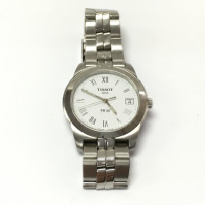 A vintage Tissot PR50 wrist watch. Seen running 36mm face. Postage B