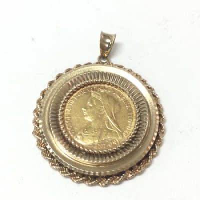 A 1896 full sovereign in a 9ct gold pendant mount. Total weight 16.59. Postage A