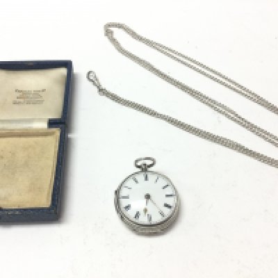 A silver pocket watch in nice condition and seen working. No personal inscription. Comes with long guard chain. 110.29g total. Postage B