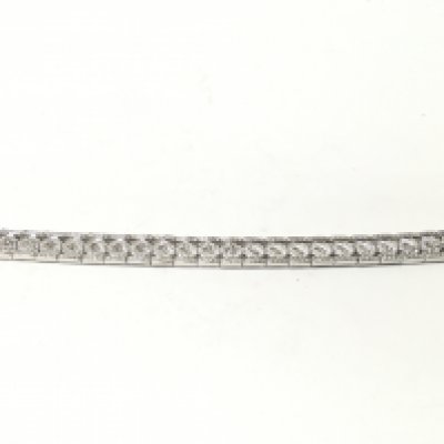 An 18ct white gold diamond bracelet. 42.07g total. 19cm long. Postage B