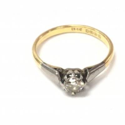 A 22ct gold diamond solitaire ring. 3.79g and Size V and approximately 0.25ct diamond.