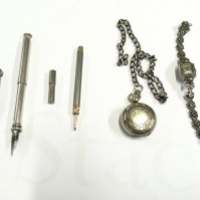 A sovereign case with chain along with a watch an propelling pencil and pen. Postage B