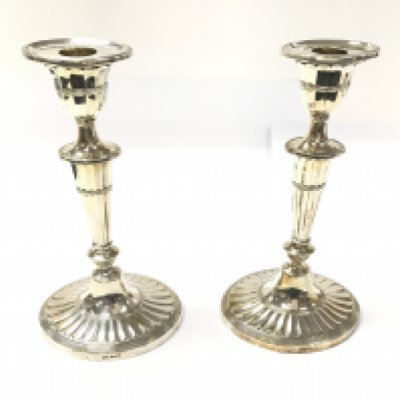 A pair of silver candlesticks by Mappin and Webb. Sheffield hallmarks 1970. 22cm high. Total weight 710g