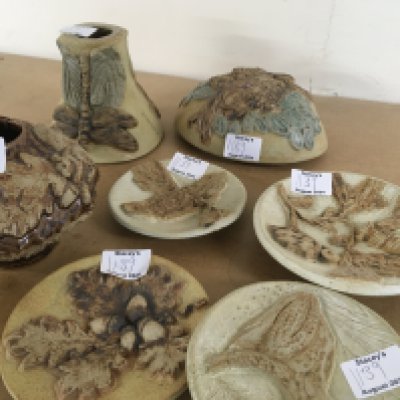 A collection of Bernard Rooke pottery comprising Four dishes; wall pocket, vase and base .