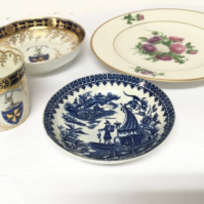 An 18th Century Worcester porcelain dish decorated in the Chinese style an Early 19th century Porcelain cup and saucer decorated with a family crest with applied gilt and a hand painted porcelain dish no obvious damage. NO RESERVE
