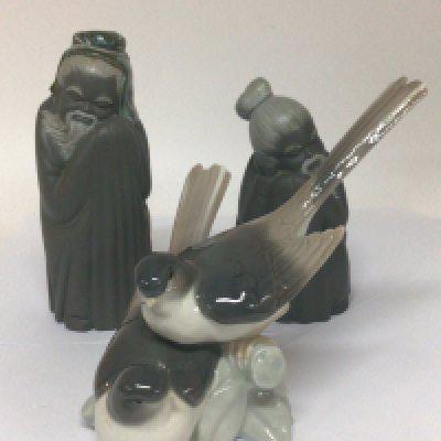 A group of Lladro figures two sleeping Chinese elders, finishing Matt Gray, and a bird ornament no obvious damage. (3) Hight of figure 22cm