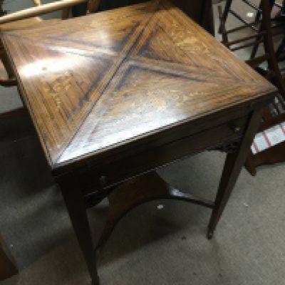An Edwardian rosewood envelope card table with inlaid design dimensions 53x53x70cm. NO RESERVE