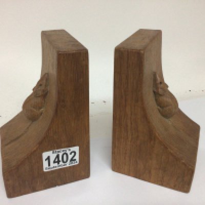 A pair of solid oak Mouse Man Robert Thompson book ends each carved with a raised mouse height 15cm.