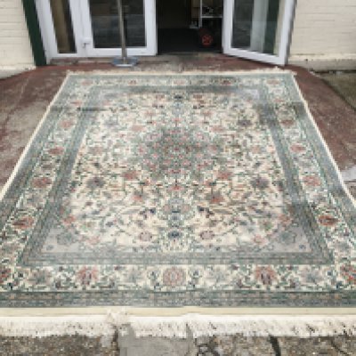 A large Chinese rug, dimensions