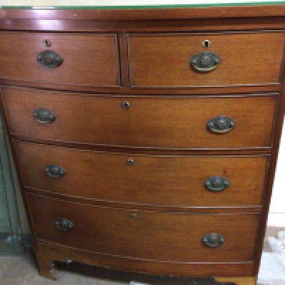 A Victorian mahogany and pine bow fronted chest of drawers two short and three long drawers.88cm x 50cm