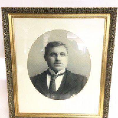 A large early 20th century gilt framed pencil sketch of a Gentleman signed Rhoda Buss. Dimensions 76x66cm This lot cannot be posted