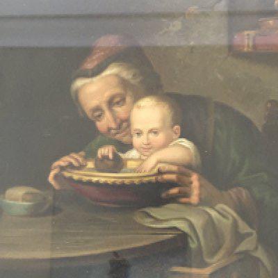 A Continental oil painting interior scene with a senior figure and young child at a kitchen table unsigned and unattributed.30cmx34cm